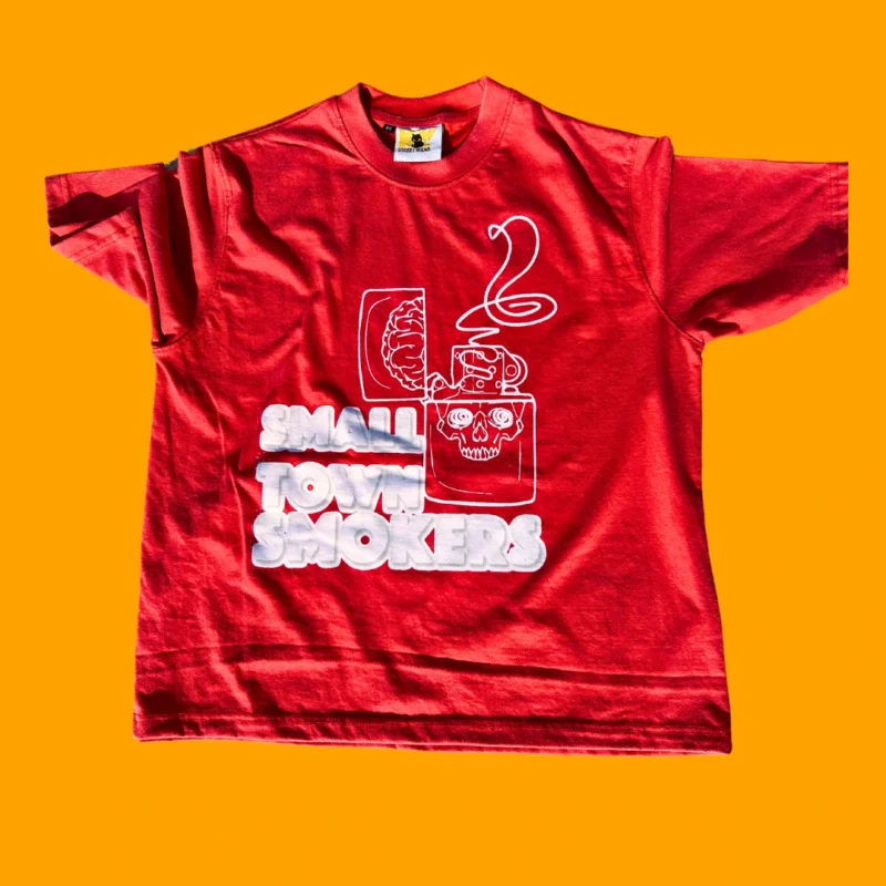 "Small Town Smokers Tee in red with bold graphic design"